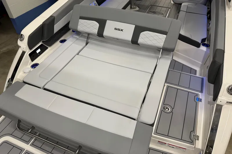 Slide: The Image of 2026 Chaparral 30 SSX boat interior with gray seating and modern design. - 17