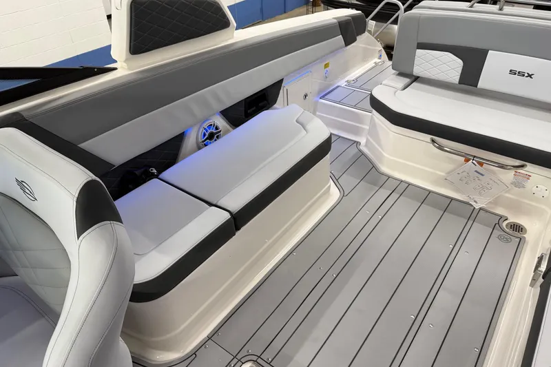 Slide: The Image of 2026 Chaparral 30 SSX boat interior with sleek seating and modern design. - 20
