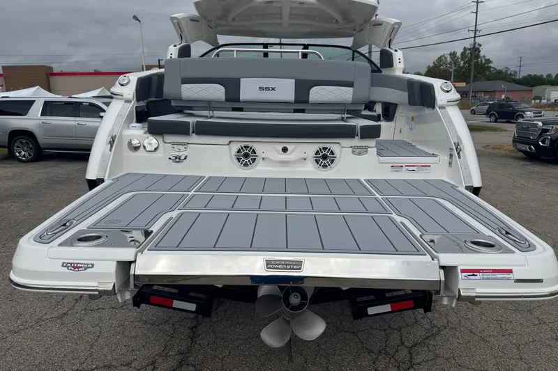 Slide: The Image of 2026 Chaparral 30 SSX boat with extended swim platform and seating area. - 5