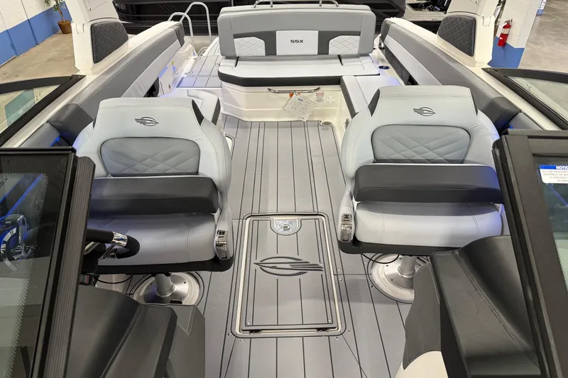 Slide: The Image of 2026 Chaparral 30 SSX boat interior with luxurious seating and modern design. - 8