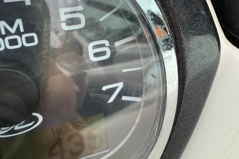 Slide: The Image of Close-up of a 2005 Sea Ray 270 SLX boat tachometer showing 435 hours. - 8