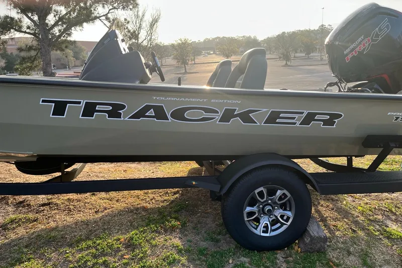 Slide: The Image of 2026 Tracker Pro Team 190 boat on trailer, featuring Mercury Pro XS engine. - 3