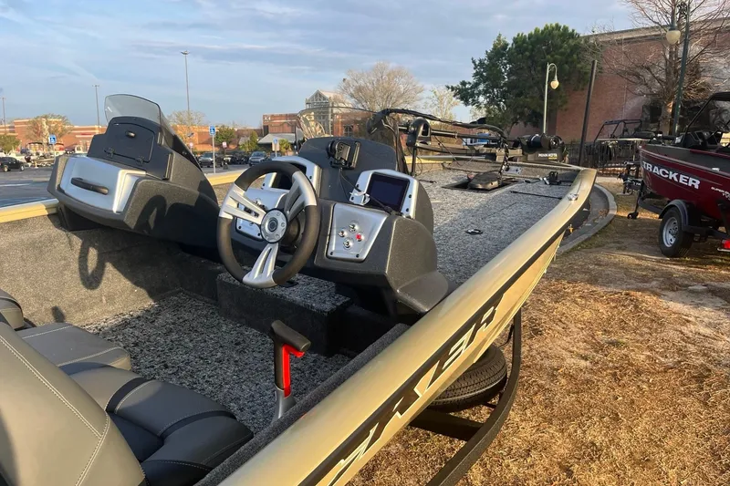 Slide: The Image of 2026 Tracker Pro Team 190 boat interior with steering wheel and controls. - 4