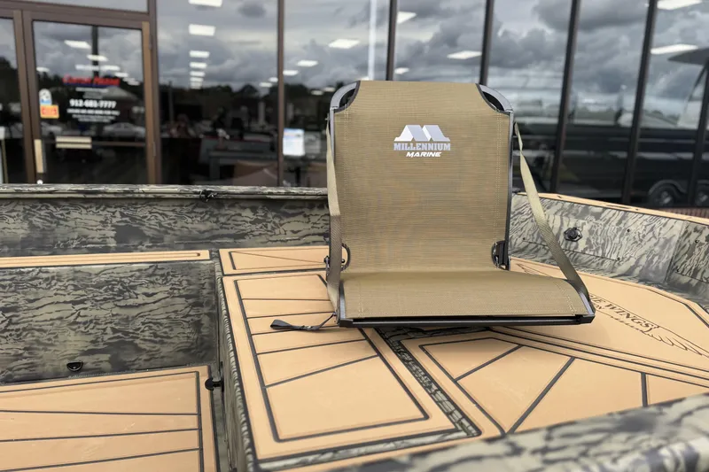 Slide: The Image of 2026 Tracker Grizzly 1650 T Prairie Wings Edition boat with Millennium Marine seat. - 5