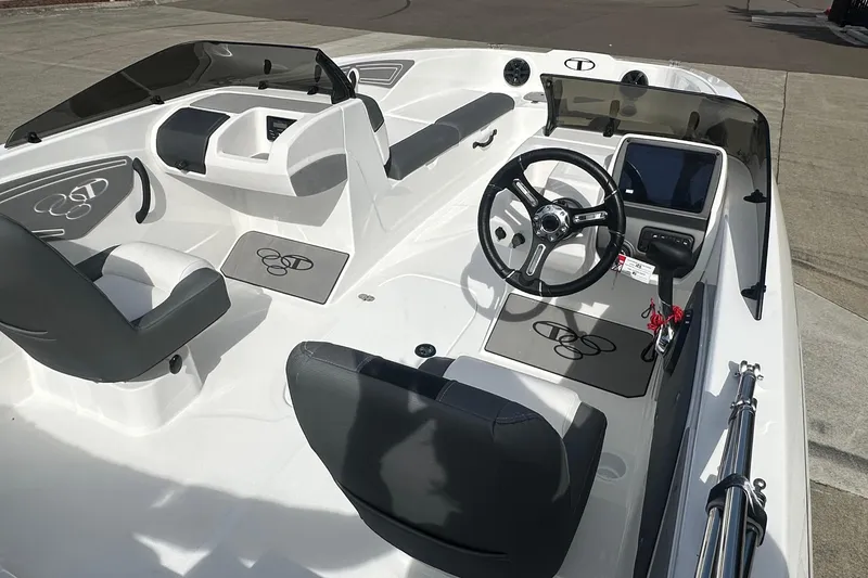 Slide: The Image of 2026 Tahoe T21 boat interior with steering wheel, seating, and dashboard controls. - 4