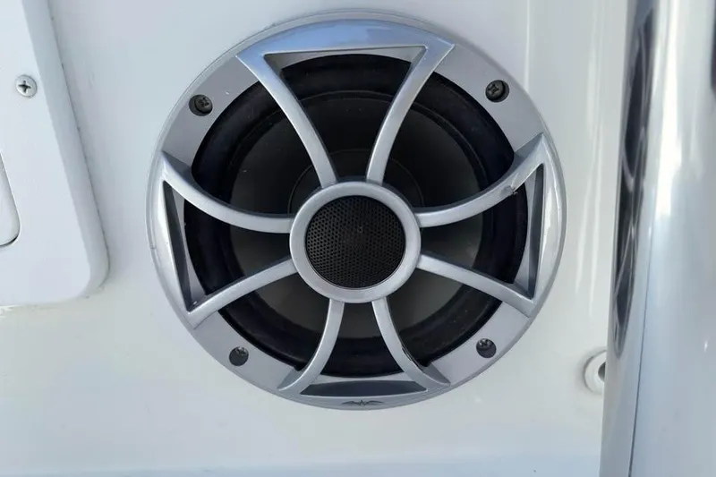 Slide: The Image of Boat speaker on Parker 180 Coastal, 2026 model, with sleek silver grille design. - 20