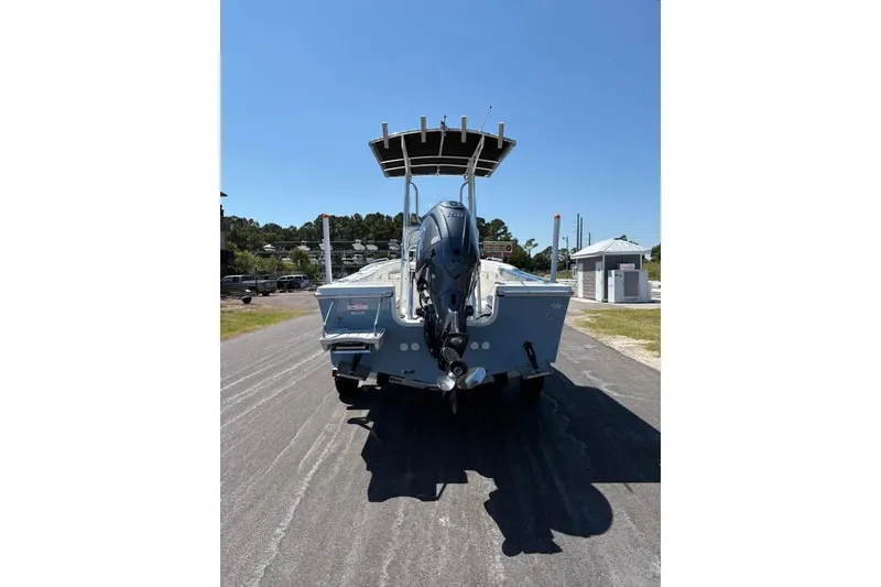 Slide: The Image of 2026 Parker 180 Coastal boat with outboard motor on a sunny day. - 4