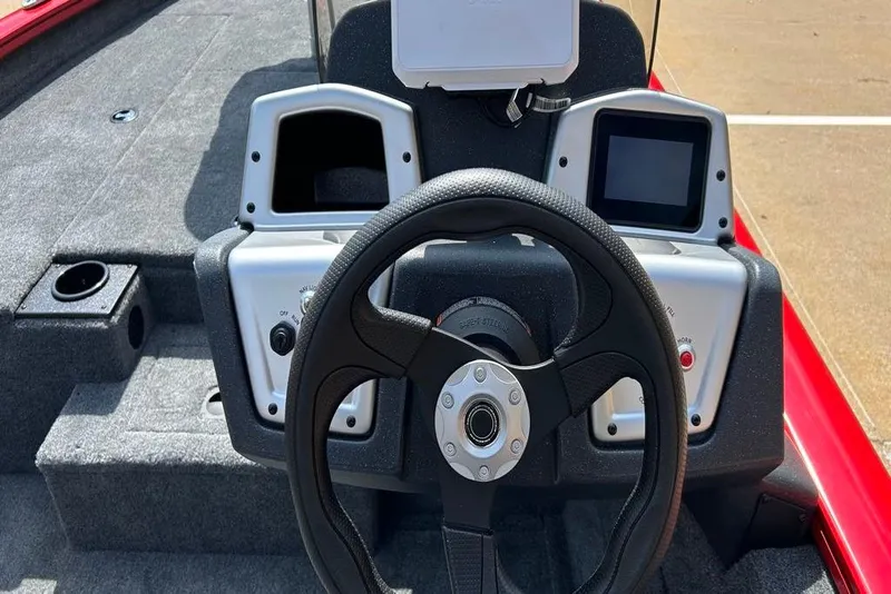 Slide: The Image of Steering console of 2026 Tracker Pro Team 190 boat with dual displays. - 7