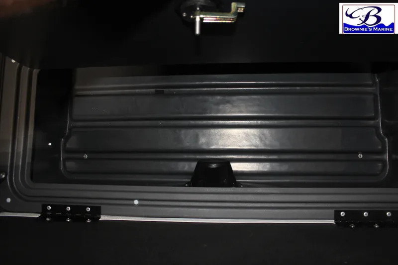 Slide: The Image of Storage compartment of 2026 Sun Tracker Fishin' Barge 22 DLX boat. - 14