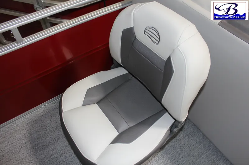 Slide: The Image of 2026 Sun Tracker Fishin' Barge 22 DLX boat seat, gray and white design, Brownie's Marine logo. - 23