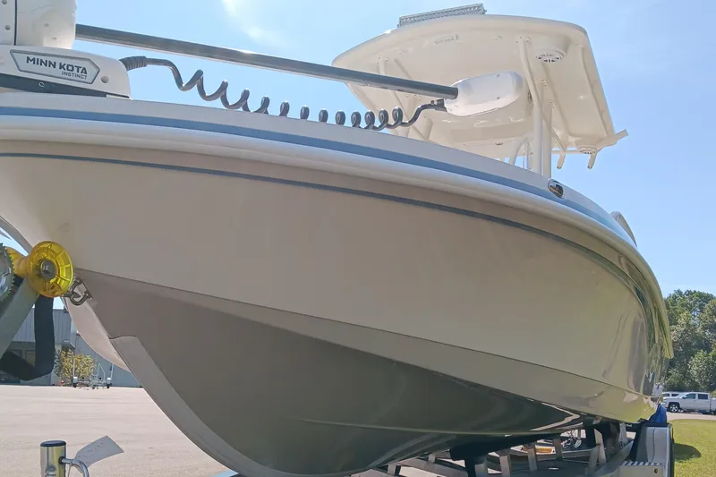 Slide: The Image of 2026 Ranger 2360 Bay boat on trailer, featuring Minn Kota trolling motor. - 10
