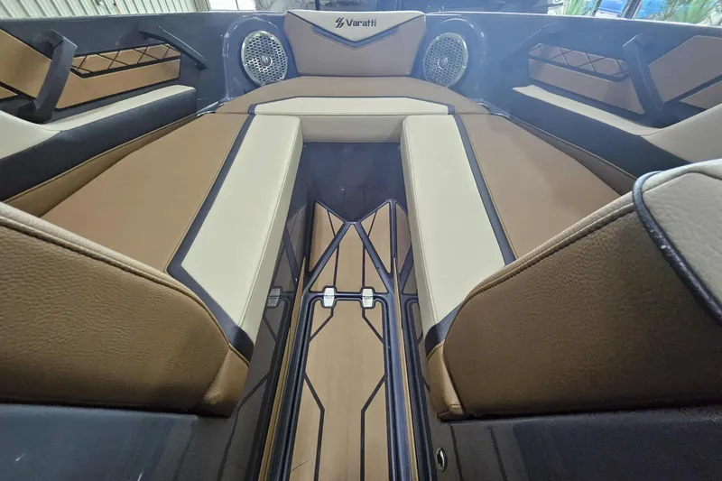Slide: The Image of Interior of 2024 Varatti Z2272 boat with luxurious brown and beige seating. - 10