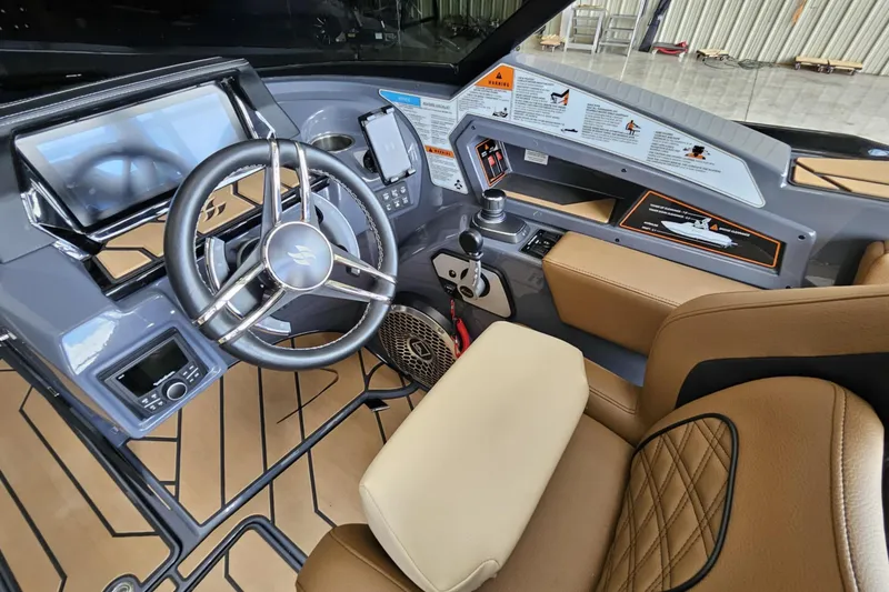 Slide: The Image of 2024 Varatti Z2272 boat cockpit with modern steering wheel and control panel. - 4