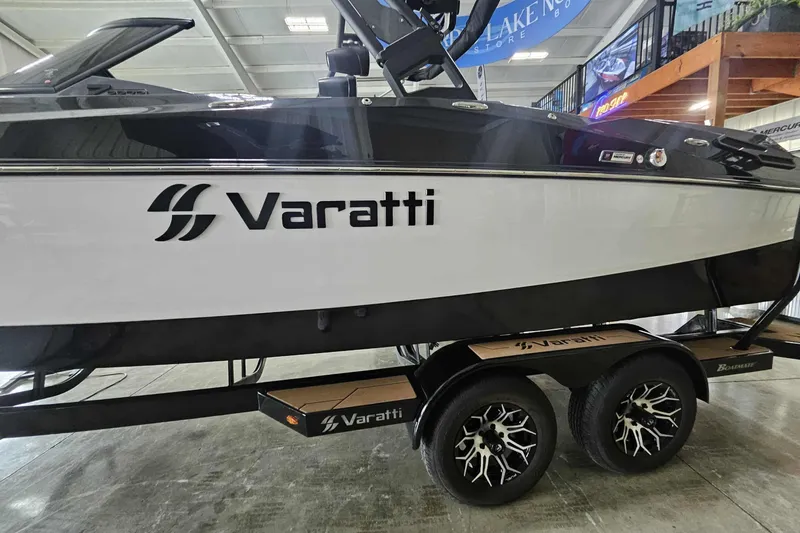 Slide: The Image of 2024 Varatti Z2272 boat on trailer, displayed indoors with sleek design. - 8