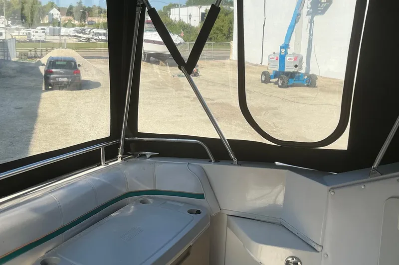 Slide: The Image of Interior view of 1992 Wellcraft 3400 Gran Sport boat with seating and window. - 9