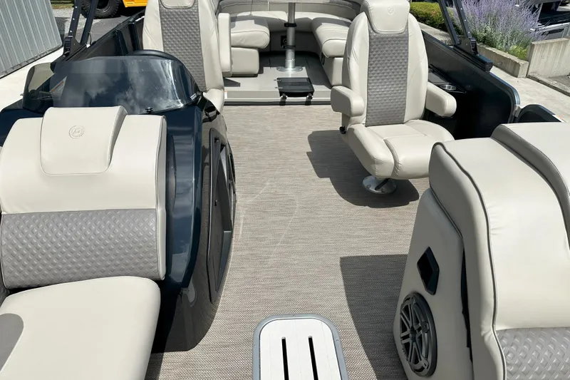 Slide: The Image of Luxurious interior of 2021 Premier 250 Solaris RE pontoon boat with plush seating. - 5