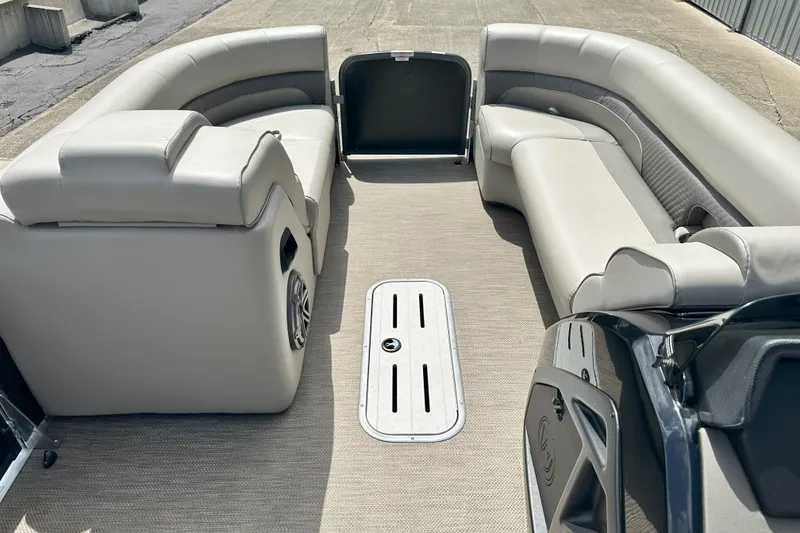 Slide: The Image of Luxurious seating on 2021 Premier 250 Solaris RE pontoon boat, featuring spacious interior design. - 8