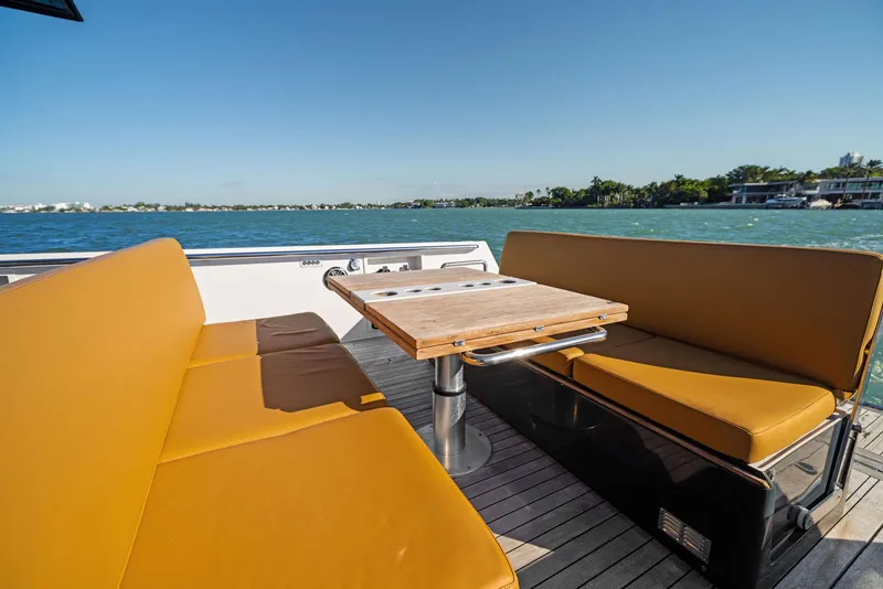 Slide: The Image of Outdoor seating on 2011 Fjord 40 Open yacht with scenic water view. - 32