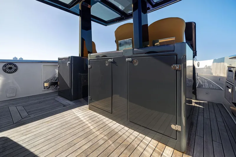 Slide: The Image of 2011 Fjord 40 Open yacht interior with sleek cabinetry and wooden flooring. - 38