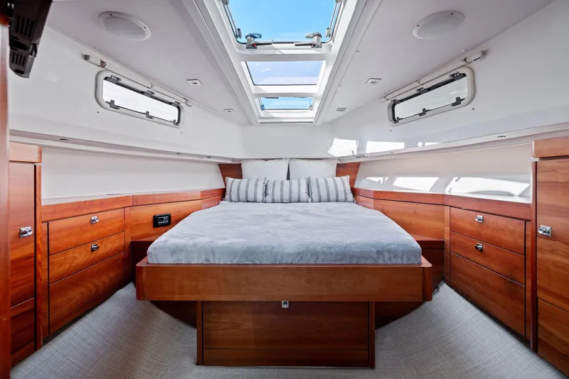 Slide: The Image of Luxurious cabin interior of 2011 Fjord 40 Open yacht with skylight and wooden furnishings. - 43