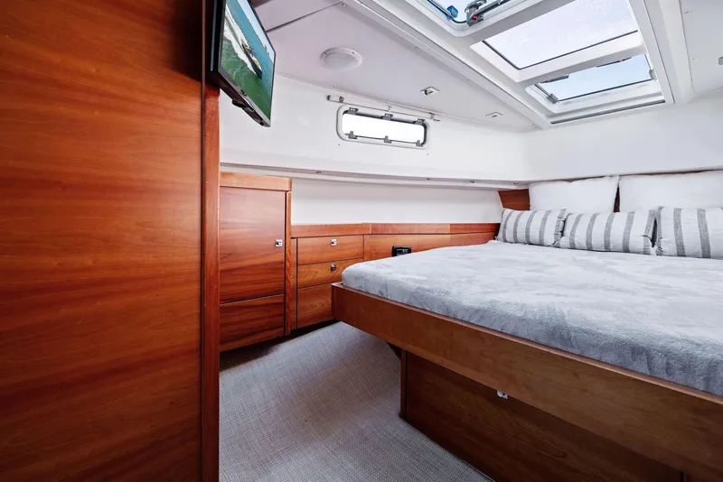 Slide: The Image of Luxurious cabin interior of 2011 Fjord 40 Open yacht with wood finish and skylights. - 44