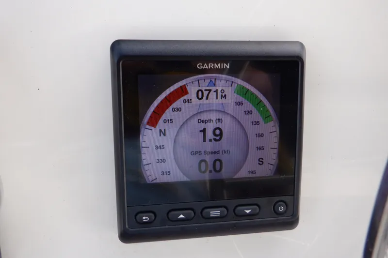 Slide: The Image of Garmin display on 1998 Bayliner 4788 Pilot House Motoryacht showing depth and GPS speed. - 12