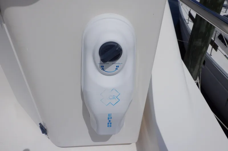 Slide: The Image of EPIRB device on 1998 Bayliner 4788 Pilot House Motoryacht deck. - 23