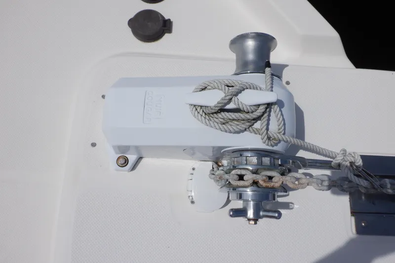 Slide: The Image of Anchor winch on 1998 Bayliner 4788 Pilot House Motoryacht deck with rope and chain. - 35