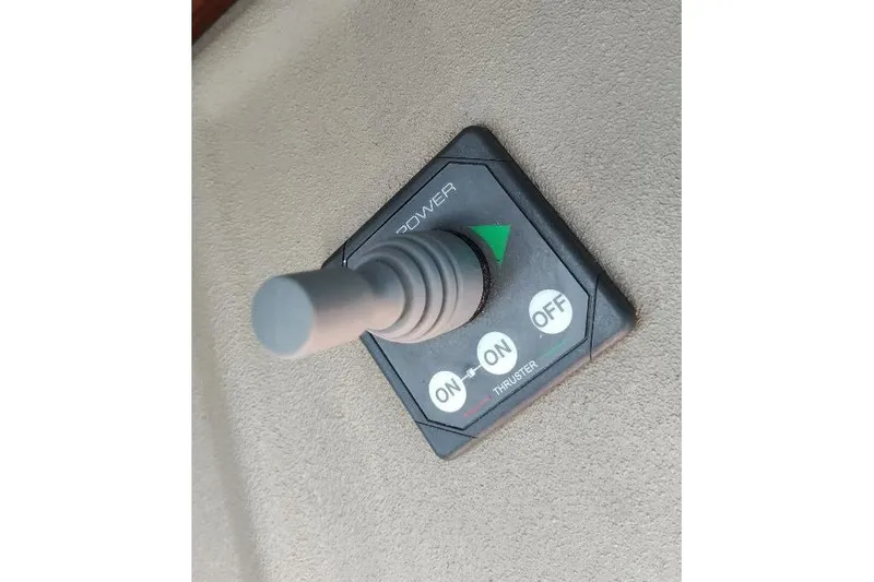 Slide: The Image of Control panel of 1998 Bayliner 4788 Pilot House Motoryacht with thruster switch. - 51