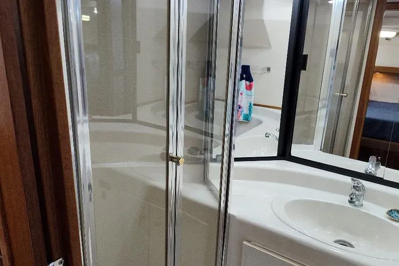 Slide: The Image of Bathroom interior of 1998 Bayliner 4788 Pilot House Motoryacht with shower and sink. - 60