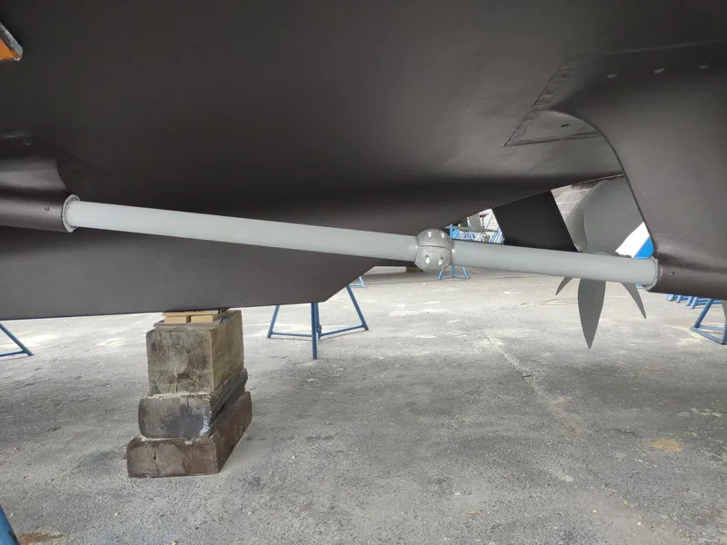 Slide: The Image of Underwater view of 1996 Hatteras 50' Sport Deck propeller and shaft. - 12