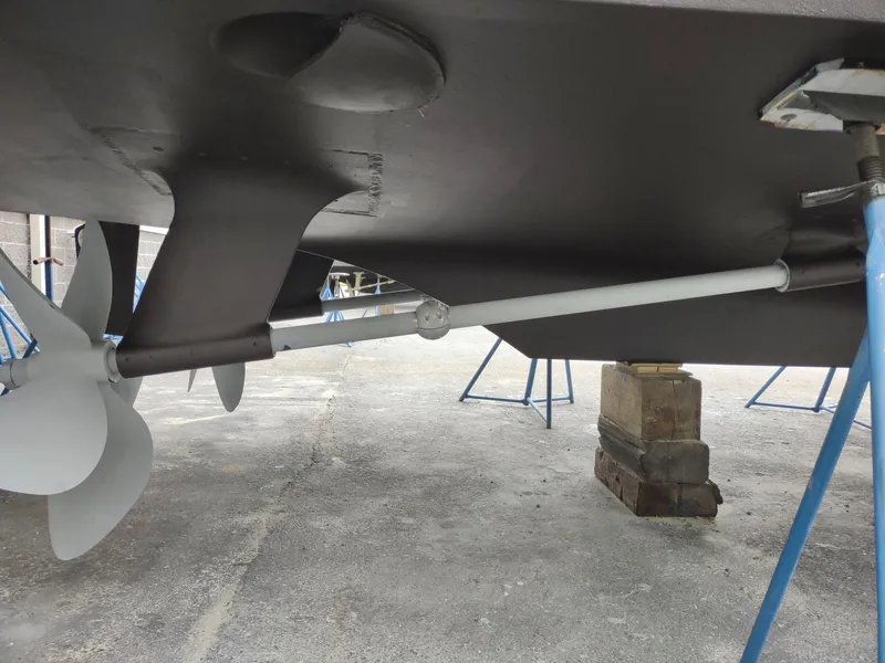 Slide: The Image of Underwater view of 1996 Hatteras 50' Sport Deck propeller and shaft. - 17