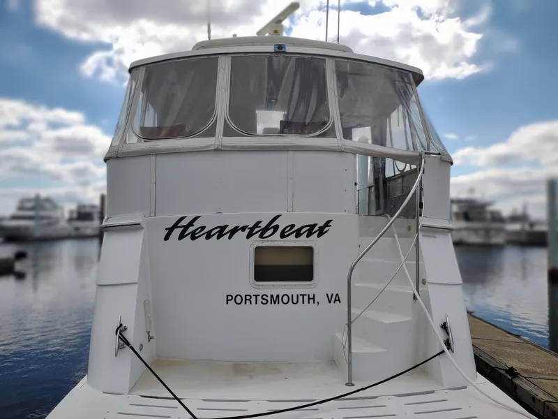 Slide: The Image of 1996 Hatteras 50' Sport Deck yacht named "Heartbeat" docked in Portsmouth, VA. - 3