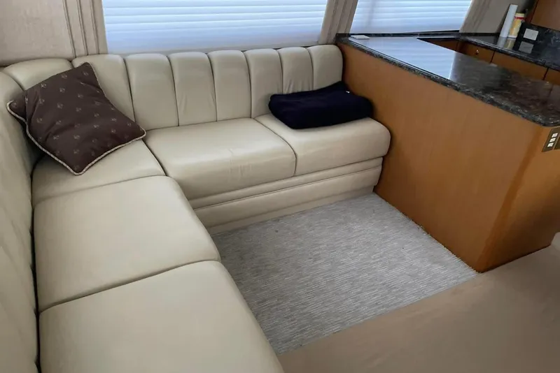 Slide: The Image of Luxurious interior of 2005 Ocean Yachts 46 Super Sport with cream leather seating. - 14