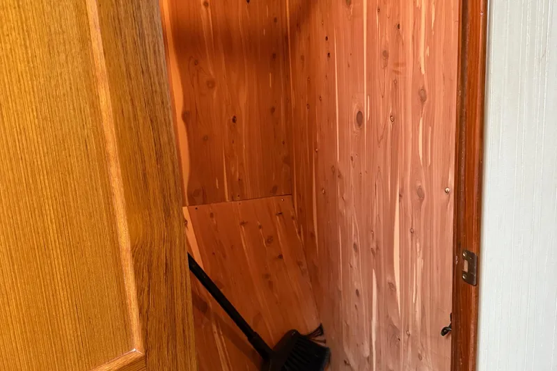 Slide: The Image of Wooden interior closet on 2005 Ocean Yachts 46 Super Sport. - 26