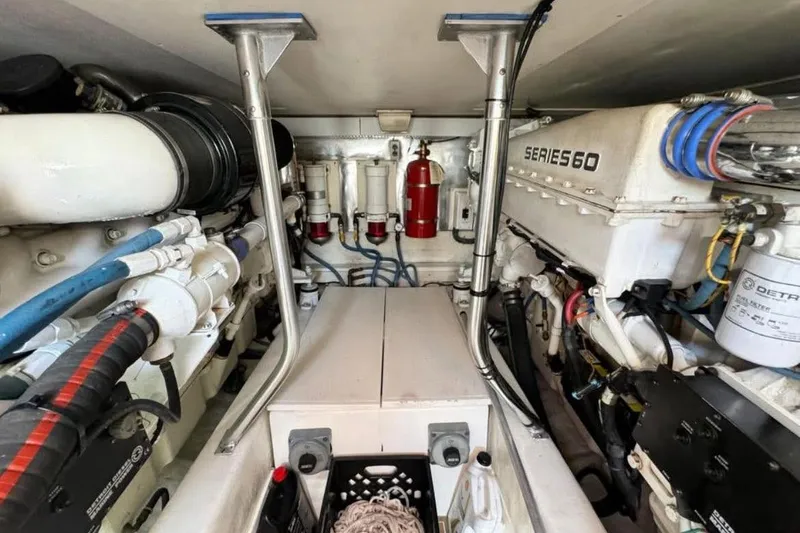 Slide: The Image of Engine room of 2005 Ocean Yachts 46 Super Sport, featuring Series 60 engine components. - 27