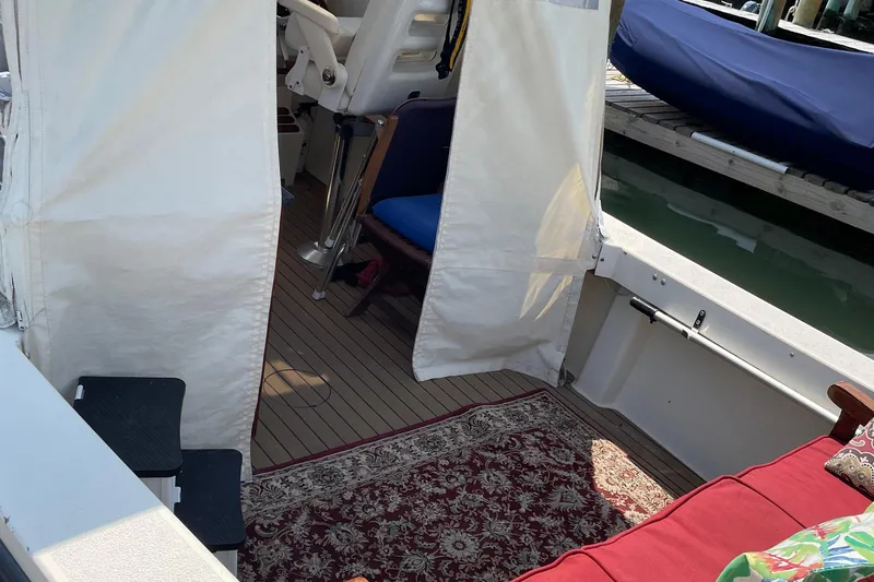 Slide: The Image of Interior of 2009 Eastern 248 Explorer boat with seating and carpet. - 5