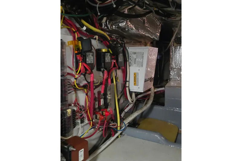 Slide: The Image of Electrical wiring and components inside a 2000 Nordic Tug 42 Flybridge boat. - 37