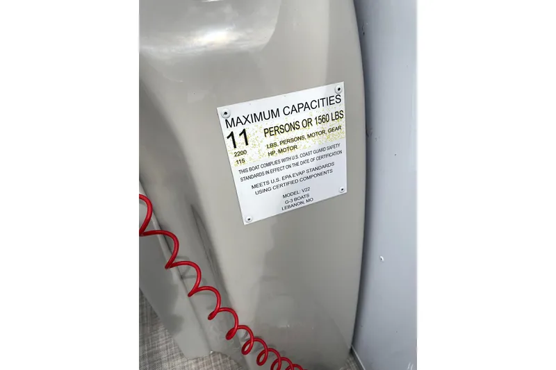 Slide: The Image of Capacity label on 2019 G3 SunCatcher V22 boat, maximum 11 persons or 1560 lbs. - 17