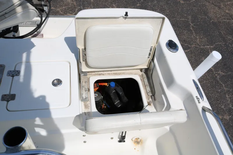 Slide: The Image of Open storage compartment on 2005 NauticStar 2200 Nautic Bay boat deck. - 28