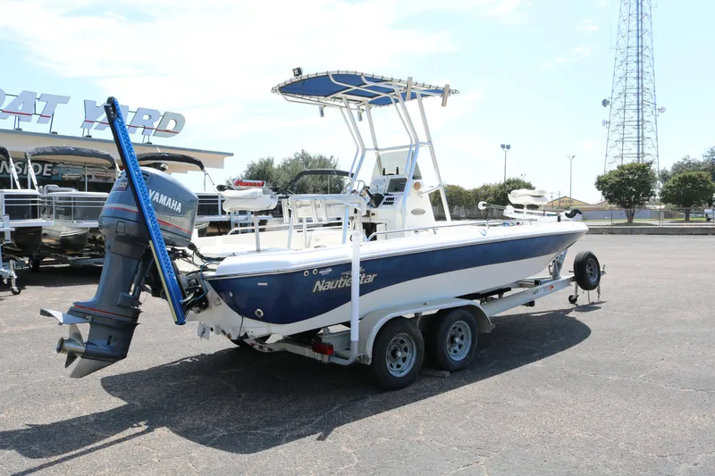Slide: The Image of 2005 NauticStar 2200 Nautic Bay boat on trailer with Yamaha outboard motor. - 6