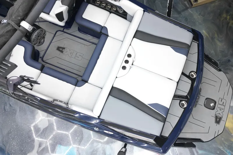 Slide: The Image of 2019 Axis A20 boat interior with sleek seating and modern design. - 13