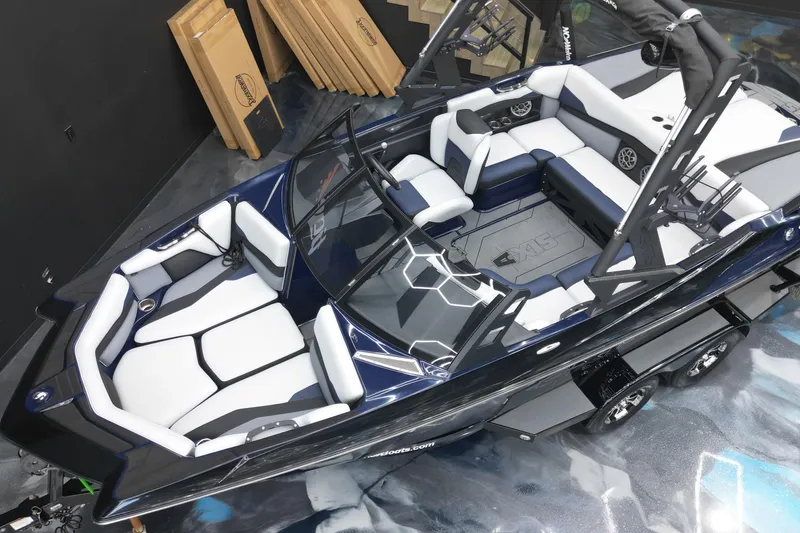 Slide: The Image of 2019 Axis A20 boat with sleek interior design and modern seating arrangement. - 4