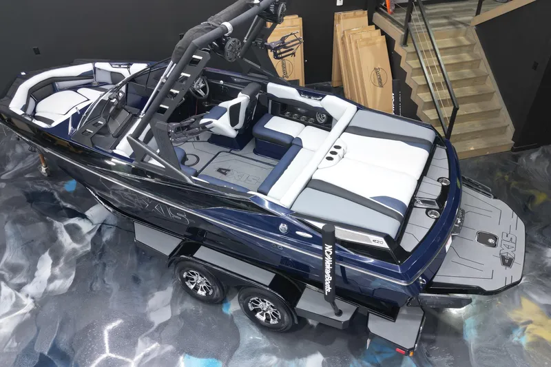 Slide: The Image of 2019 Axis A20 boat with sleek design, luxury seating, and advanced wakeboard tower. - 6