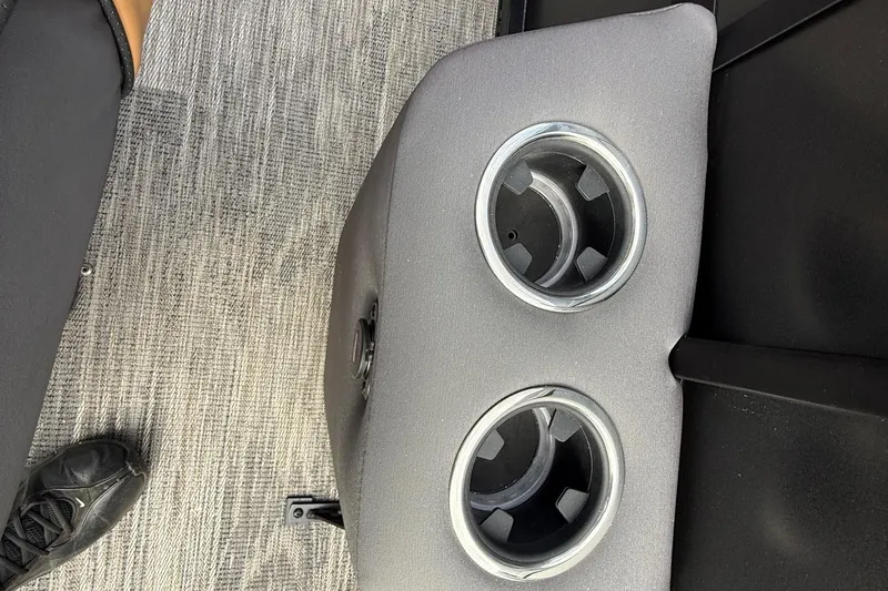 Slide: The Image of 2026 Viaggio Lago Z22S-CC interior with dual cup holders and textured flooring. - 12