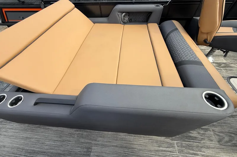 Slide: The Image of 2026 Viaggio Lago Z22S-CC boat interior with tan and gray seating, featuring cup holders. - 19