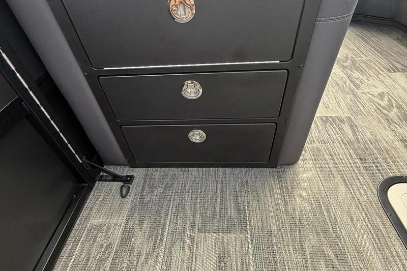 Slide: The Image of 2026 Viaggio Lago Z22S-CC interior with sleek black storage drawers and modern flooring. - 21