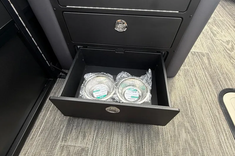 Slide: The Image of Open drawer in Viaggio Lago Z22S-CC 2026 with packaged items inside. - 22