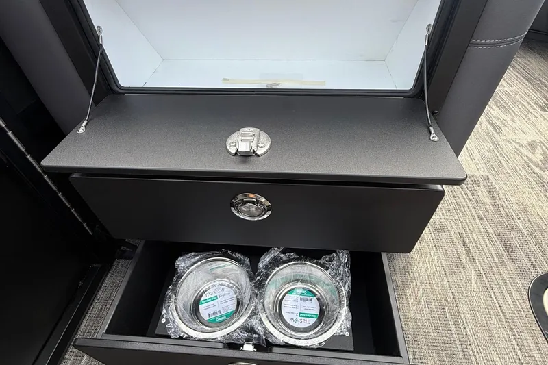 Slide: The Image of Storage compartment in 2026 Viaggio Lago Z22S-CC with bowls in lower drawer. - 24
