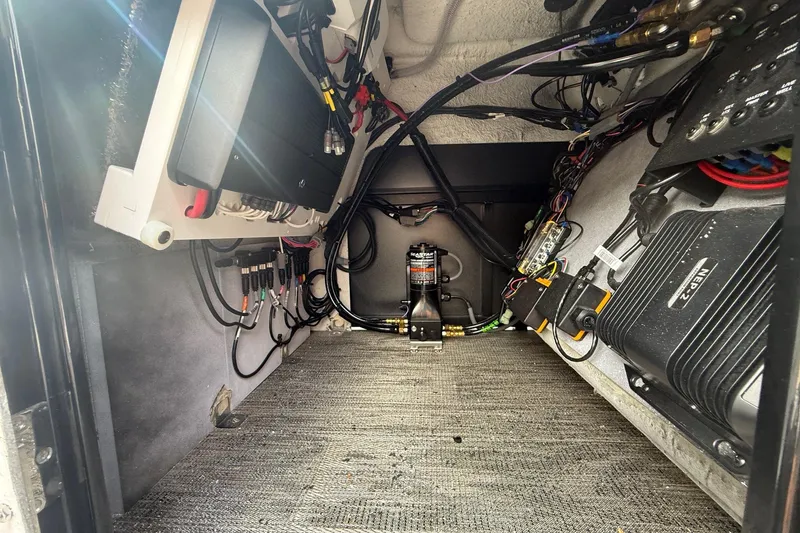 Slide: The Image of Electrical components inside 2026 Viaggio Lago Z22S-CC, showcasing wiring and equipment layout. - 26